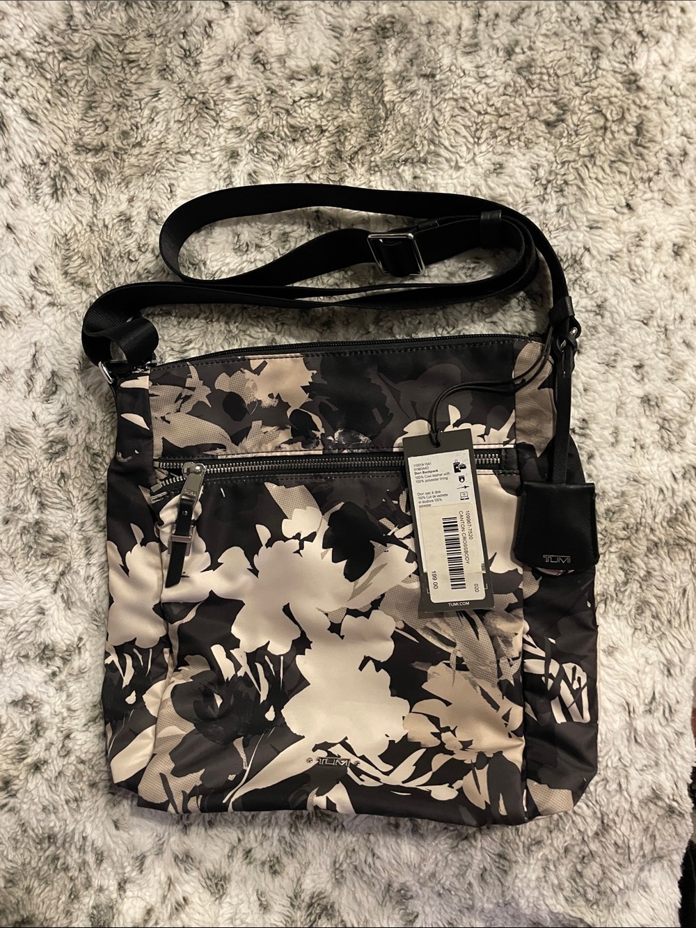 Tumi Black & Beige Floral Crossbody Bag